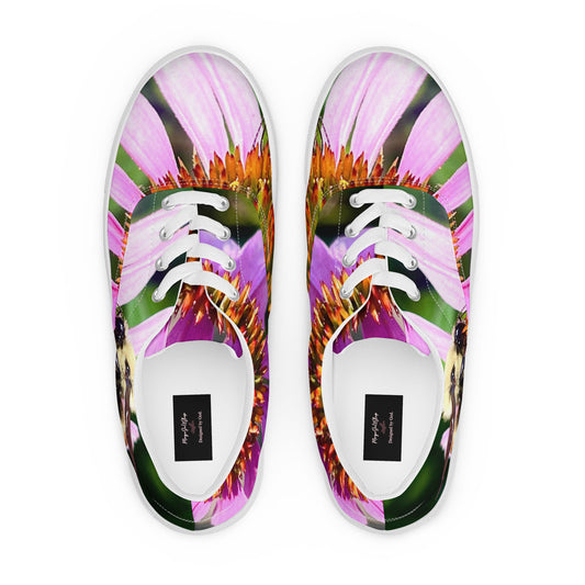 Front View of Women's Lace-Up Canvas Shoes featuring a vibrant custom design of a bumblebee on a pink coneflower, designed into a colorful floral pattern with pink, orange, and green accents