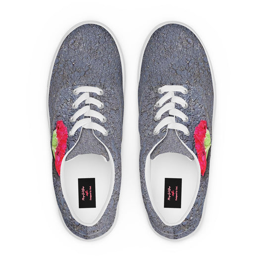 Pair of lace-up canvas sneakers featuring a textured asphalt pattern across the upper, accented with vibrant red and green carnation designs on the sides for a bold, nature-inspired streetwear look.